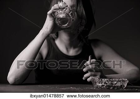Stock Photo - Woman with beer and cigarette. Fotosearch