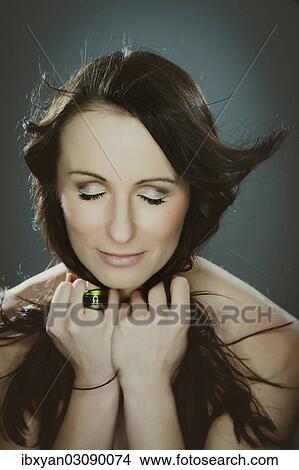Woman with eyes closed View Large Photo Image Picture - Woman with eyes closed. Fotosearch