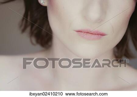 Stock Image - Woman's closed mouth. Fotosearch