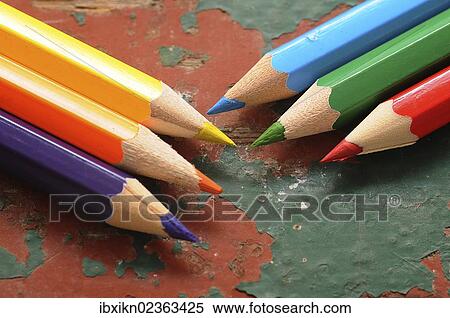 Wooden coloured pencils on an old wooden board View Large Photo Image Stock Photography - Wooden coloured pencils on an old wooden board. Fotosearch