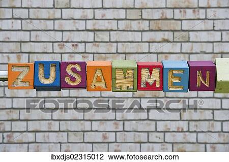 "Wooden cubes spelling """"zusammen"""" or """"together"""", in a school, Offenburg Baden-Wuerttemberg, Germany, Europe" View Large Photo Image Stock Image - "Wooden cubes spelling """"zusammen"""" or """"together"""", in a school, Offenburg Baden-Wuerttemberg, Germany, Europe". Fotosearch