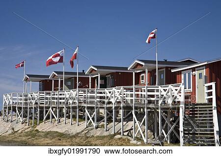 "Wooden houses with flags of Greenland, Sisimiut, Greenland, North America" View Large Photo Image Stock Image - "Wooden houses with flags of Greenland, Sisimiut, Greenland, North America". Fotosearch