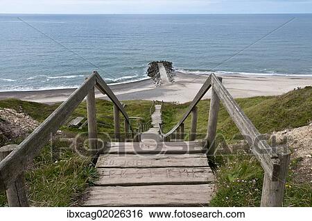 Stock Photograph - "Wooden stairs to the beach on the coast of Bovbjerg, Bovbjerg-Klint, West Jutland, Denmark, Europe". Fotosearch