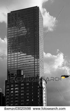 "Wooden water storage on a roof in front of a skyscraper, Manhattan, Midtown, New York City, New York, United States, North America" View Large Photo Image Stock Photo - "Wooden water storage on a roof in front of a skyscraper, Manhattan, Midtown, New York City, New York, United States, North America". Fotosearch