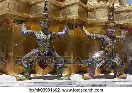 "Yaksha statues at the golden chedi, Wat Phra Kaeo or Wat Phra Kaew, Grand Palace, Royal Palace, Bangkok, Thailand, Asia" View Large Photo Image Stock Image - "Yaksha statues at the golden chedi, Wat Phra Kaeo or Wat Phra Kaew, Grand Palace, Royal Palace, Bangkok, Thailand, Asia". Fotosearch