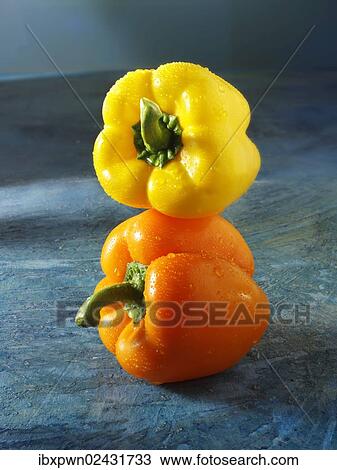 Yellow and orange peppers View Large Photo Image Stock Image - Yellow and orange peppers. Fotosearch