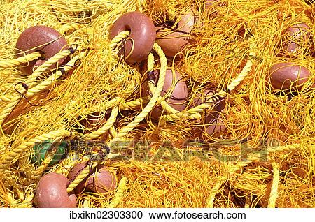 Yellow fishing net View Large Photo Image Stock Image - Yellow fishing net. Fotosearch