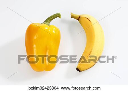 Picture - "Yellow fruit and vegetables, yellow bell pepper and banana". Fotosearch