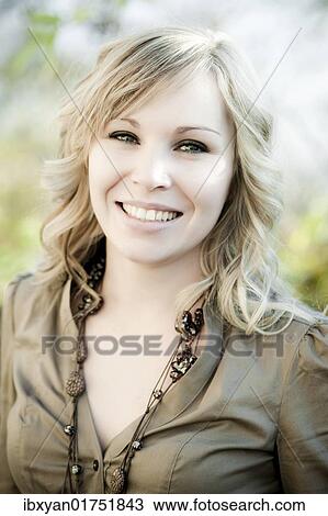 Stock Image - "Young blond woman, portrait". Fotosearch