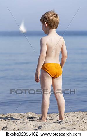 "Young boy on the beach, Kuehlungsborn, Mecklenburg-Western Pomerania, Germany, Europe" View Large Photo Image Stock Image - "Young boy on the beach, Kuehlungsborn, Mecklenburg-Western Pomerania, Germany, Europe". Fotosearch