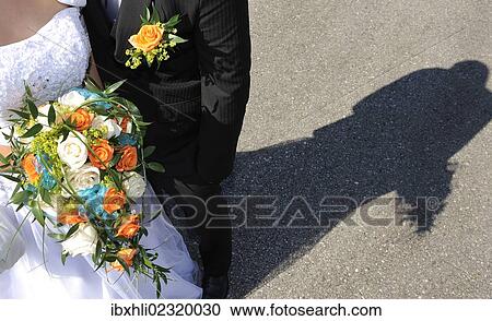 Stock Image - "Young bridal couple, shadow". Fotosearch