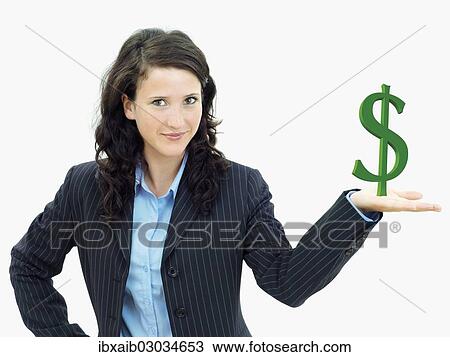 Young businesswoman holding a dollar sign View Large Photo Image Stock Image - Young businesswoman holding a dollar sign. Fotosearch