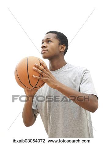 Young male playing basketball View Large Photo Image Stock Image - Young male playing basketball. Fotosearch