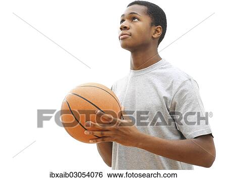 Young male playing basketball View Large Photo Image Stock Photograph - Young male playing basketball. Fotosearch