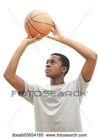 Young male playing basketball View Large Photo Image Stock Photography - Young male playing basketball. Fotosearch