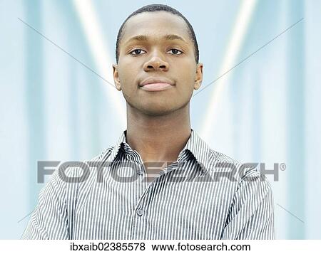 "Young man, African-American, American, serious face, respectable" View Large Photo Image Stock Photo - "Young man, African-American, American, serious face, respectable". Fotosearch
