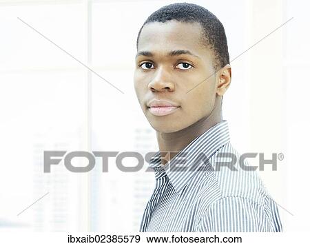 "Young man, African-American businessman, American, serious face, respectable" View Large Photo Image Stock Photo - "Young man, African-American businessman, American, serious face, respectable". Fotosearch