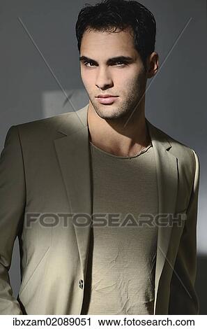 "Young man lit by sunlight, portrait" View Large Photo Image Stock Image - "Young man lit by sunlight, portrait". Fotosearch