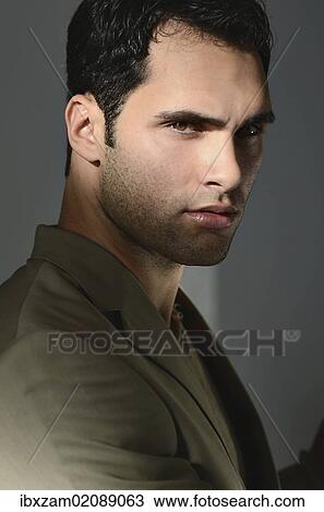"Young man lit by sunlight, portrait" View Large Photo Image Stock Image - "Young man lit by sunlight, portrait". Fotosearch