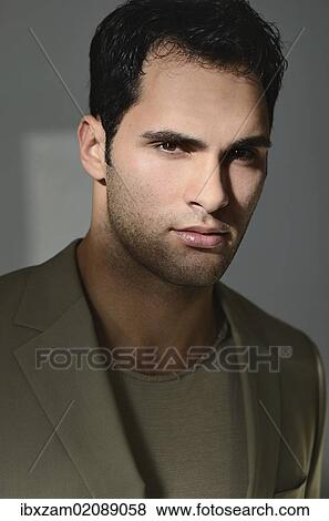 "Young man lit by sunlight, portrait" View Large Photo Image Stock Photo - "Young man lit by sunlight, portrait". Fotosearch