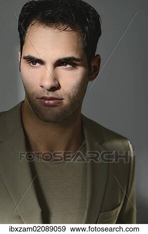 "Young man lit by sunlight, portrait" View Large Photo Image Stock Photo - "Young man lit by sunlight, portrait". Fotosearch