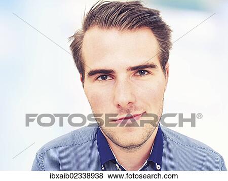 "Young man, portrait, sly glance" View Large Photo Image Stock Photo - "Young man, portrait, sly glance". Fotosearch