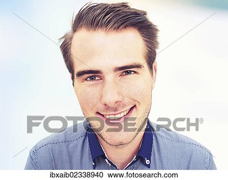 "Young man, portrait, smiling" View Large Photo Image Stock Image - "Young man, portrait, smiling". Fotosearch