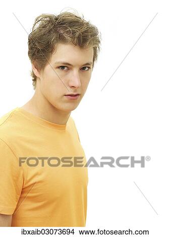 Picture - "Young man, serious, portrait". Fotosearch