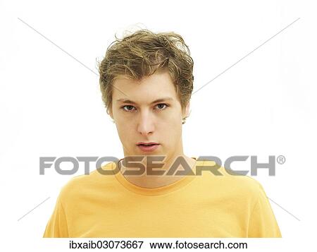 "Young man, serious, portrait" View Large Photo Image Stock Photo - "Young man, serious, portrait". Fotosearch