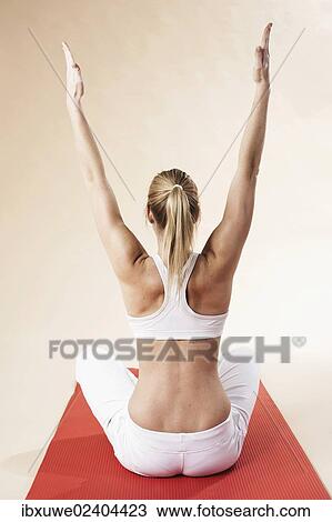Young woman doing yoga View Large Photo Image Stock Image - Young woman doing yoga. Fotosearch