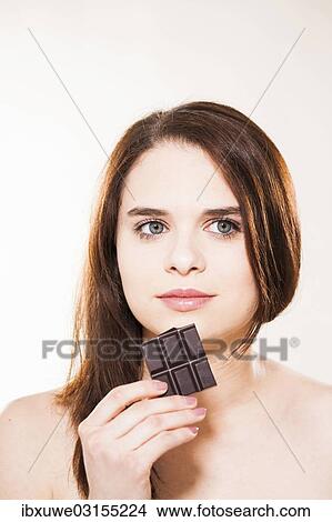 "Young woman enjoying chocolate, Mannheim, Baden-Wurttemberg, Germany, Europe" View Large Photo Image Picture - "Young woman enjoying chocolate, Mannheim, Baden-Wurttemberg, Germany, Europe". Fotosearch