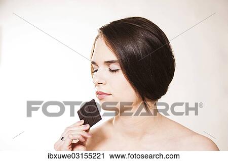"Young woman enjoying chocolate, Mannheim, Baden-Wurttemberg, Germany, Europe" View Large Photo Image Stock Image - "Young woman enjoying chocolate, Mannheim, Baden-Wurttemberg, Germany, Europe". Fotosearch