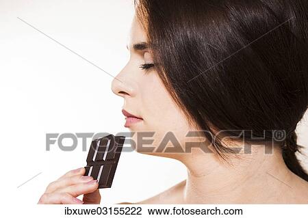 "Young woman enjoying chocolate, Mannheim, Baden-Wurttemberg, Germany, Europe" View Large Photo Image Stock Image - "Young woman enjoying chocolate, Mannheim, Baden-Wurttemberg, Germany, Europe". Fotosearch