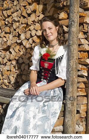 "Young woman in traditional costume, Tyrolean traditional costume typical for the region Achensee, Pertisau am Achensee, Tyrol, Austria, Europe" View Large Photo Image Stock Photo - "Young woman in traditional costume, Tyrolean traditional costume typical for the region Achensee, Pertisau am Achensee, Tyrol, Austria, Europe". Fotosearch
