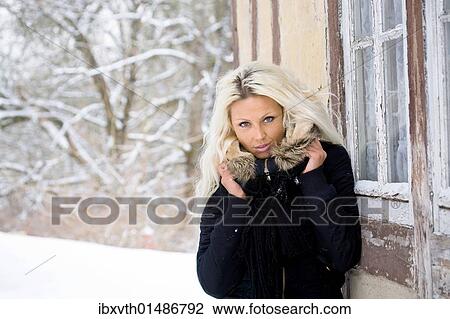 Stock Image - "Young woman in winter, portrait". Fotosearch