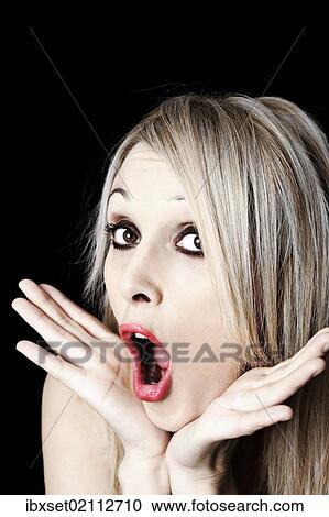 "Young woman looking astonished, funny portrait" View Large Photo Image Stock Image - "Young woman looking astonished, funny portrait". Fotosearch