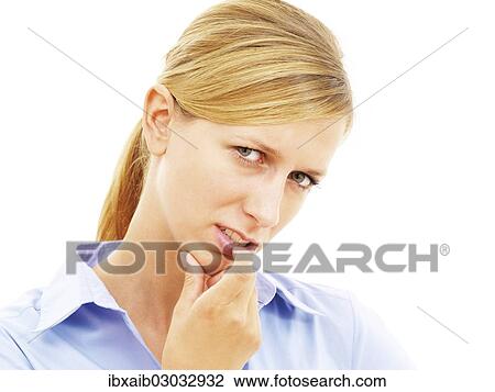 "Young woman looking pensive, skeptical" View Large Photo Image Stock Image - "Young woman looking pensive, skeptical". Fotosearch
