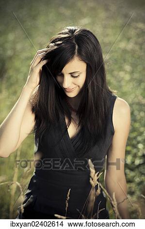 "Young woman, outdoors" View Large Photo Image Picture - "Young woman, outdoors". Fotosearch