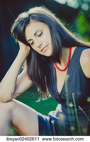 "Young woman, outdoors" View Large Photo Image Stock Image - "Young woman, outdoors". Fotosearch