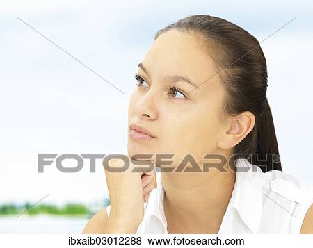 "Young woman, pensive, portrait" View Large Photo Image Stock Photo - "Young woman, pensive, portrait". Fotosearch