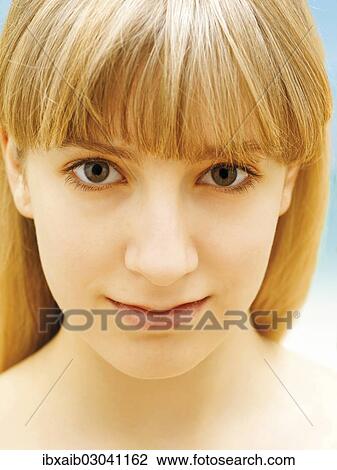Stock Image - "Young woman, portrait". Fotosearch