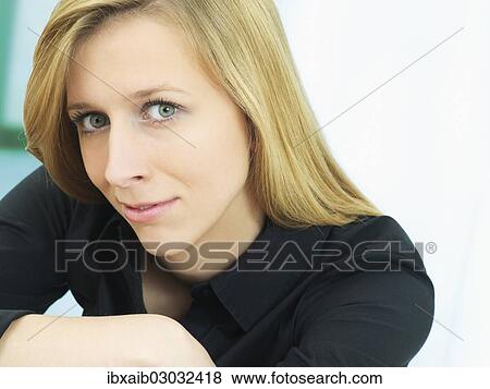 Young woman relaxing View Large Photo Image Stock Photo - Young woman relaxing. Fotosearch