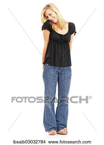 Picture - "Young woman, smiling, standing". Fotosearch