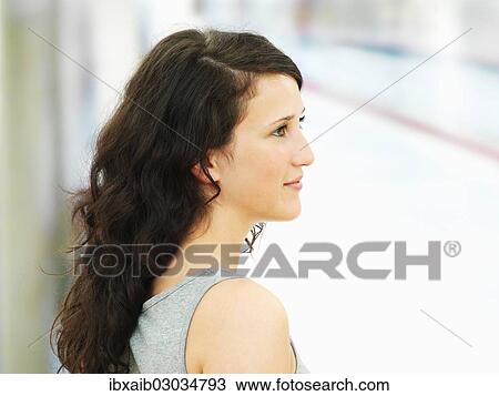 Young woman waiting at a subway station View Large Photo Image Stock Image - Young woman waiting at a subway station. Fotosearch