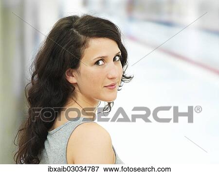 Young woman waiting at a subway station View Large Photo Image Stock Photo - Young woman waiting at a subway station. Fotosearch