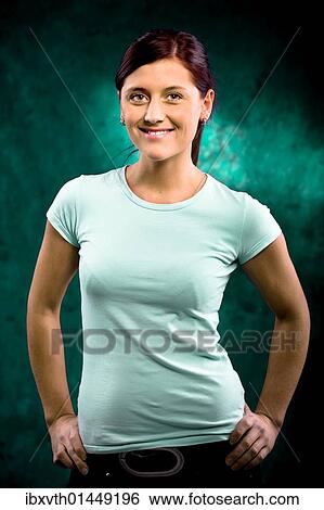 Young woman wearing a T-shirt View Large Photo Image Stock Photograph - Young woman wearing a T-shirt. Fotosearch