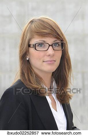 "Young woman wearing glasses, portrait" View Large Photo Image Stock Photo - "Young woman wearing glasses, portrait". Fotosearch