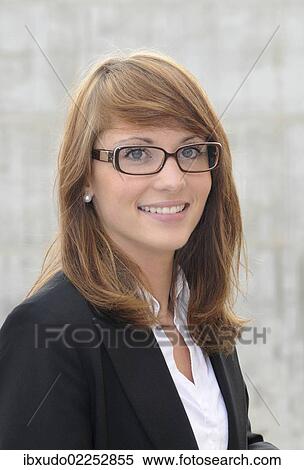 Stock Photography - "Young woman wearing glasses, portrait". Fotosearch