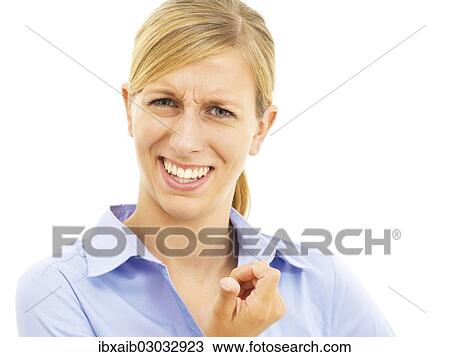 "Young woman with a critical expression, questioning" View Large Photo Image Stock Image - "Young woman with a critical expression, questioning". Fotosearch