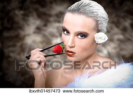 Young woman with strawberry and fur View Large Photo Image Stock Image - Young woman with strawberry and fur. Fotosearch
